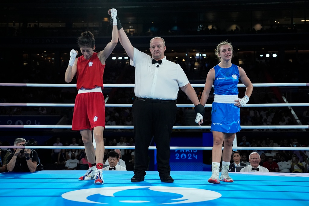 Gold for another disputed boxer