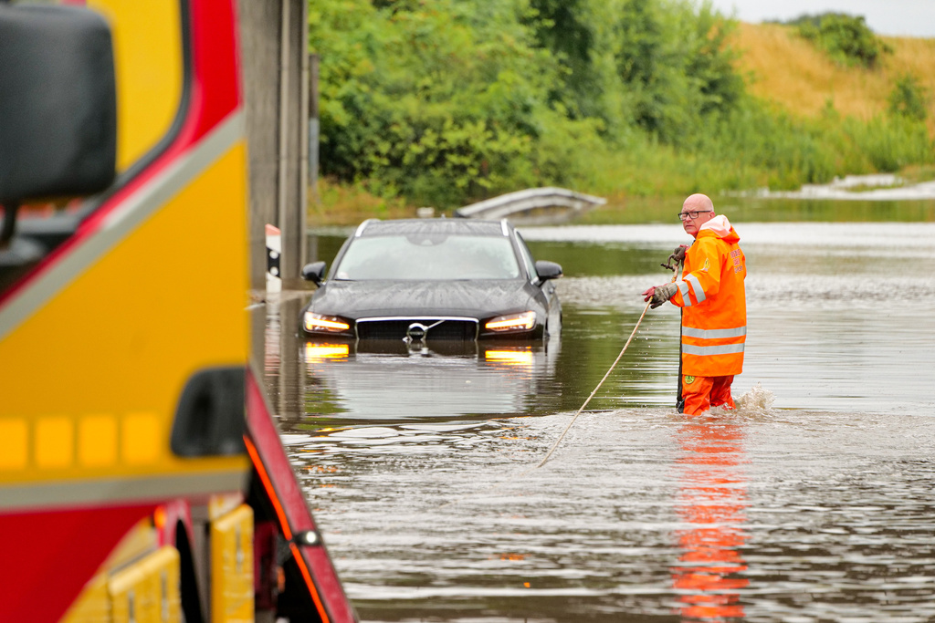 Cars stuck in water masses after heavy rain