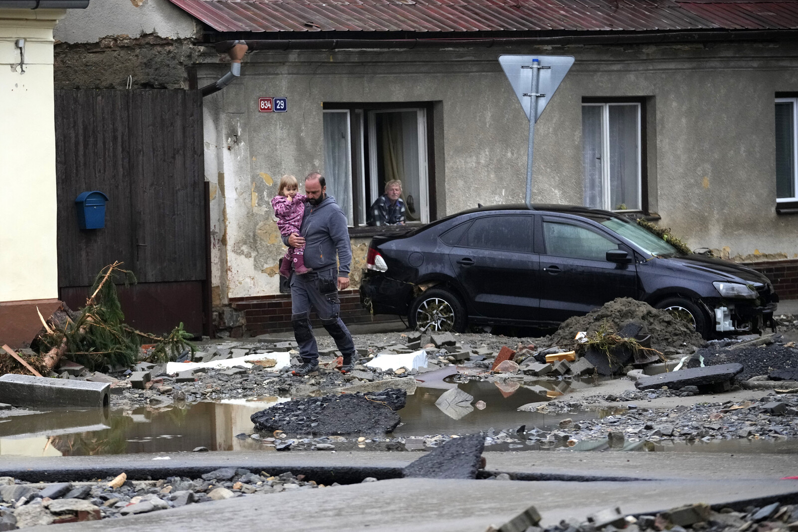 Destruction in the Wake of the Rainstorm: "Like After a War"